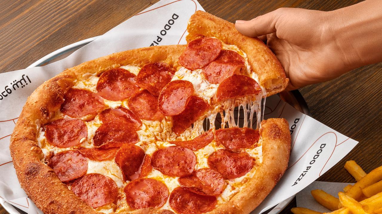 Pizza on picnic table